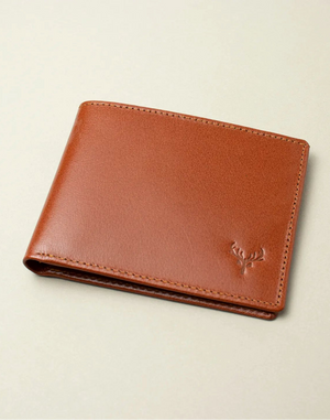 Havana leather wallet on a beige background