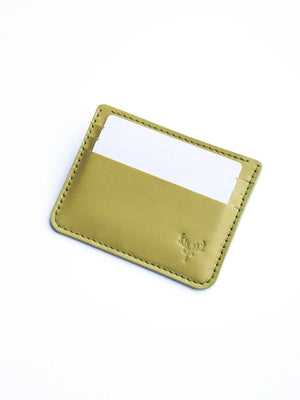 Postage cardholder with a white card on a light beige background