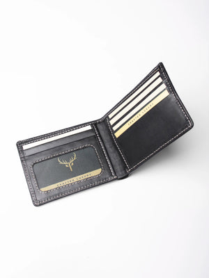 Black leather wallet with gold accents on a white background